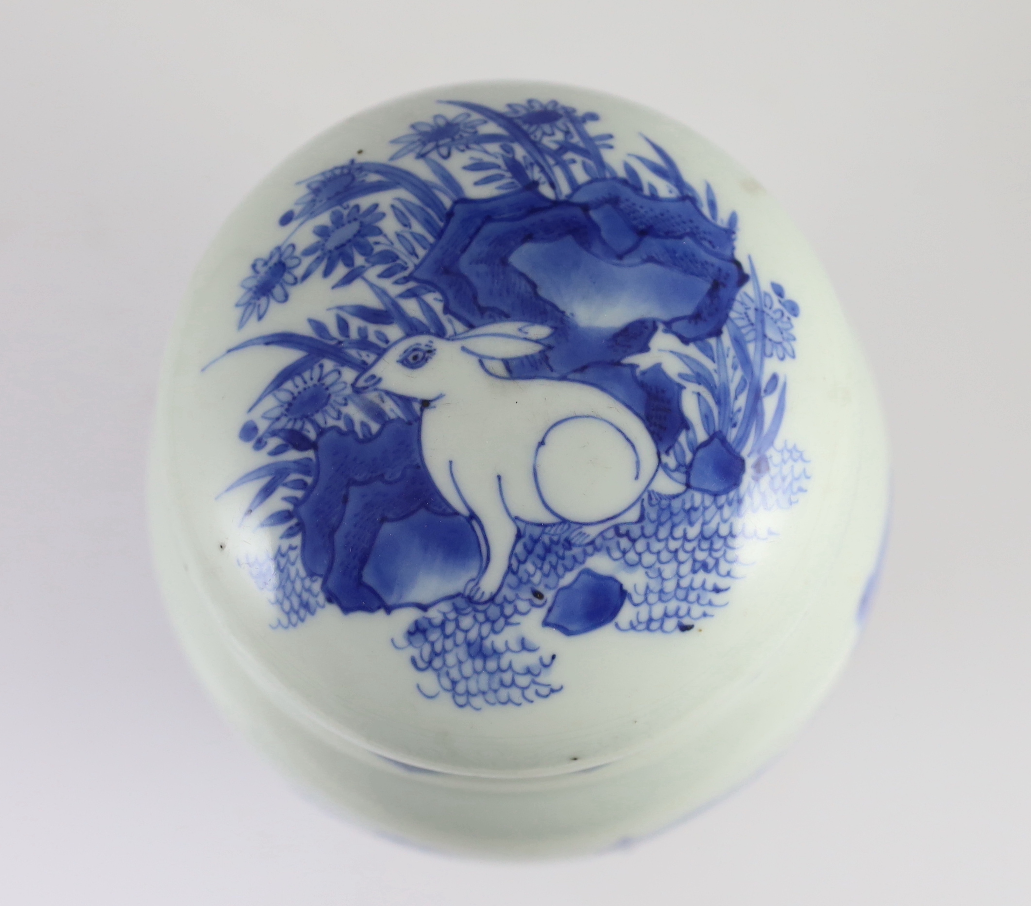 A good Chinese Transitional blue and white ‘qilin and phoenix’ jar and cover, lianzi guan, Chongzhen period (1627-1644), chips to inner flange of cover